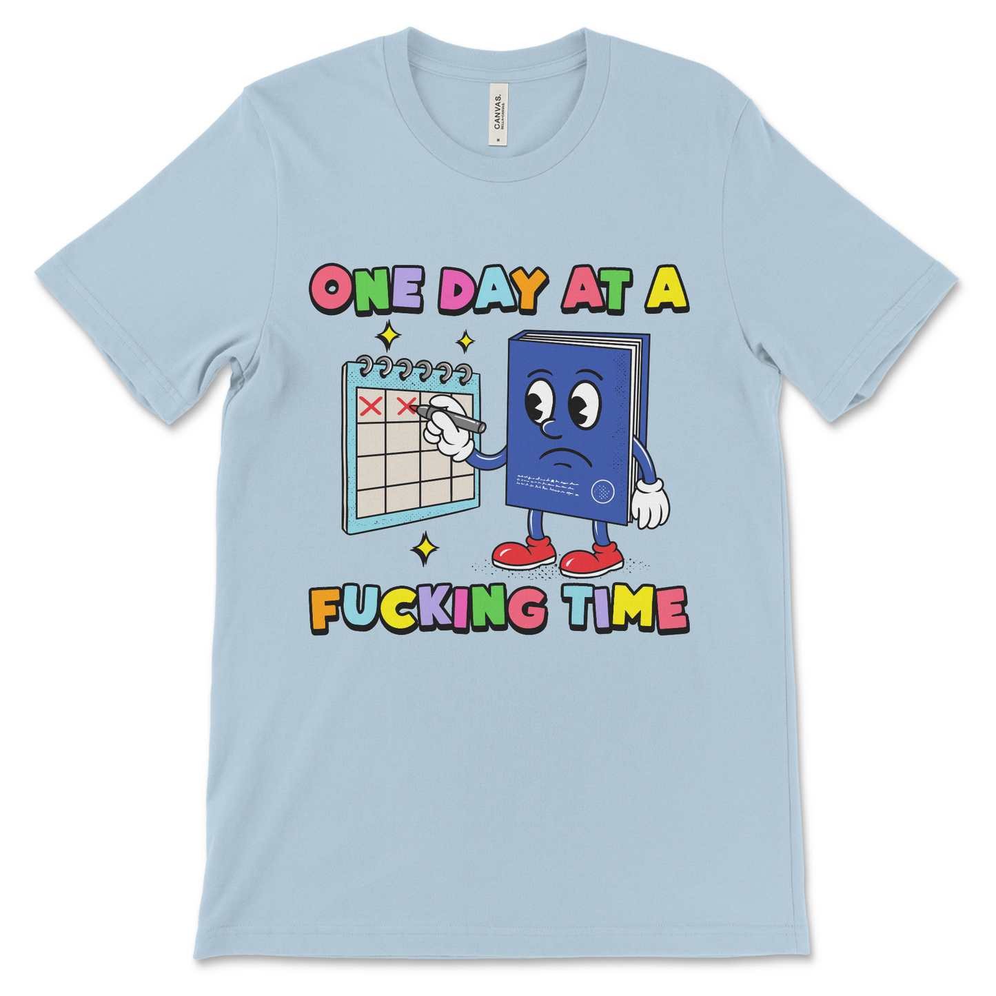AA recovery shirt with a Big Book design and the phrase “One Day at a Fucking Time,” a popular choice for sober anniversary gifts.